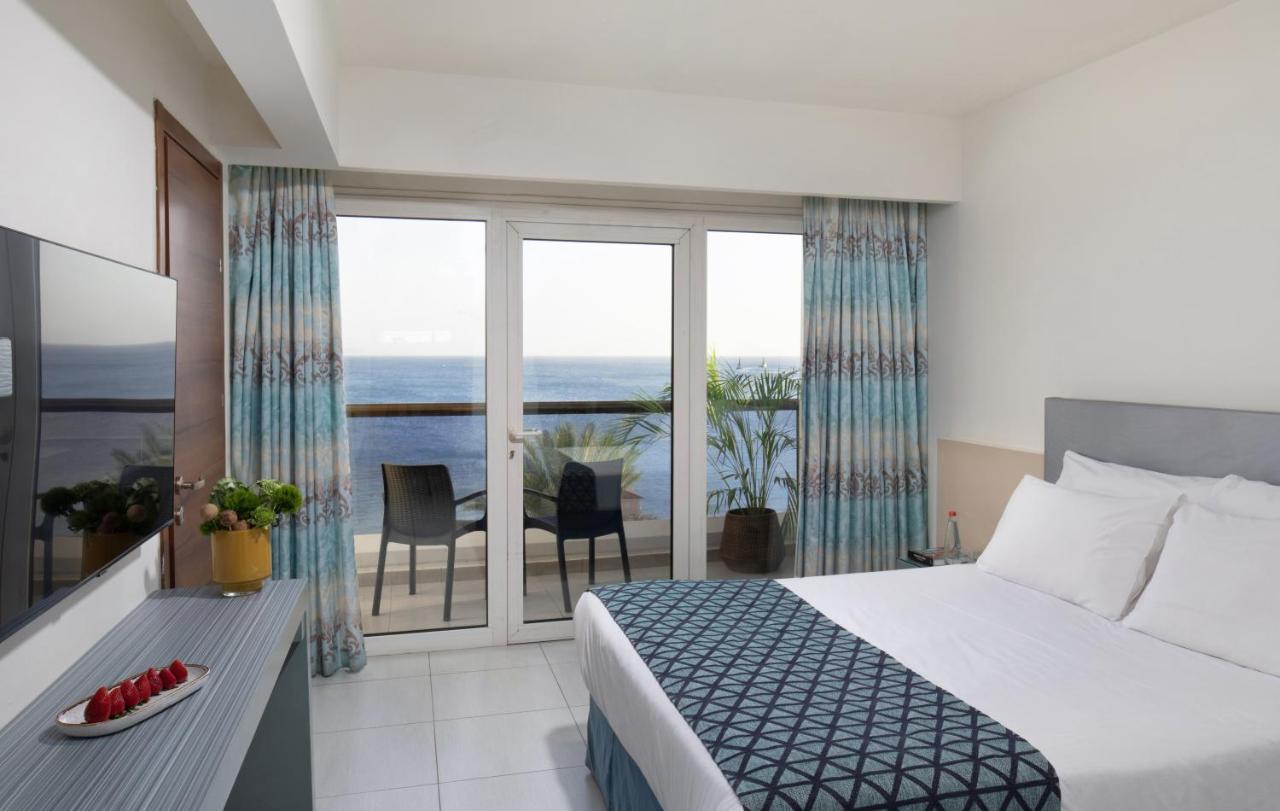 Neptune Eilat By Dan Hotels Bagian luar foto A room at the hotel