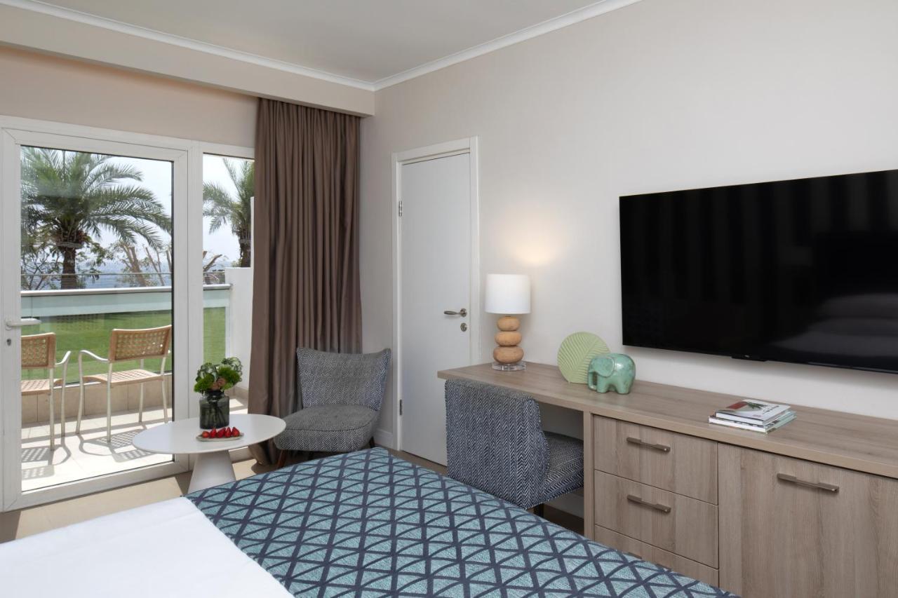 Neptune Eilat By Dan Hotels Bagian luar foto A room at the hotel