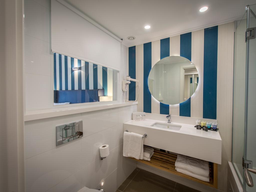 Neptune Eilat By Dan Hotels Bagian luar foto Bathroom