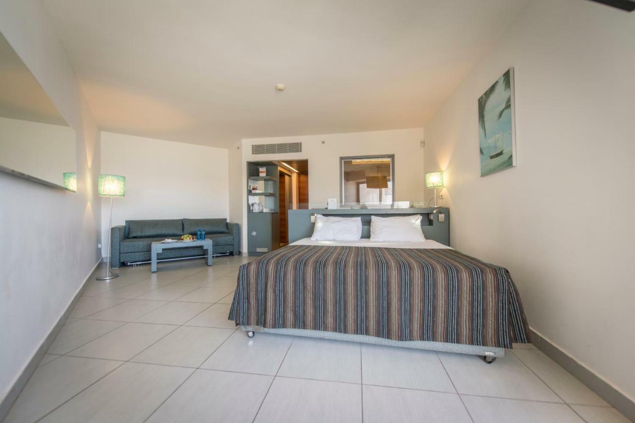 Neptune Eilat By Dan Hotels Bagian luar foto A room at the hotel