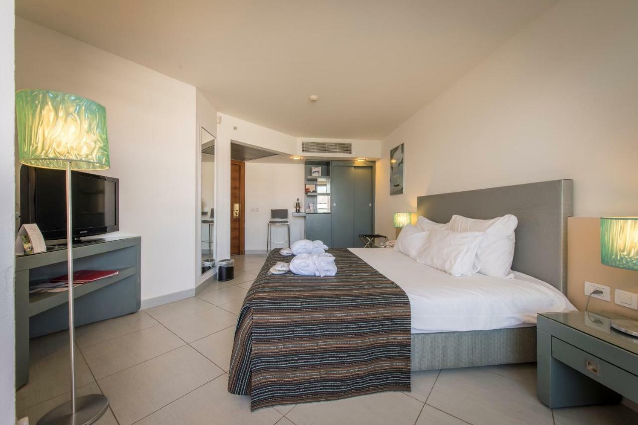 Neptune Eilat By Dan Hotels Bagian luar foto A room at the hotel